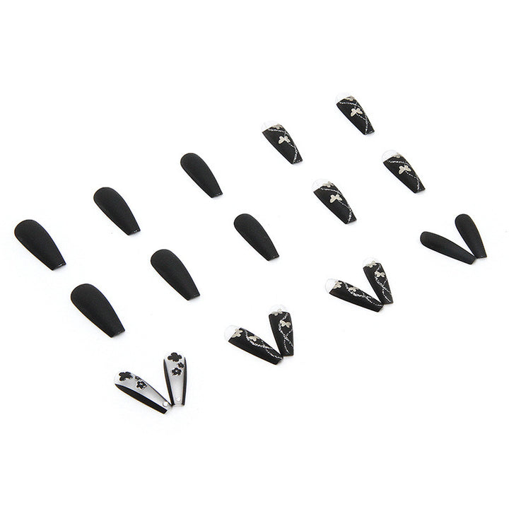 Art nail set with elegant butterfly and flower motifs Kalsten