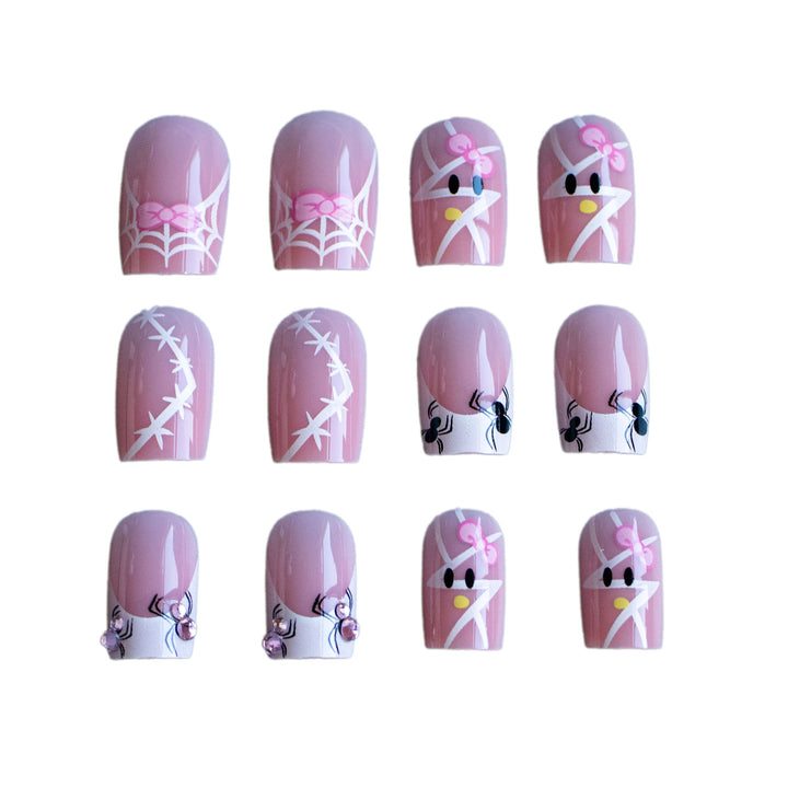 Decorative Nail Art Set with Bow and Spider Web Design