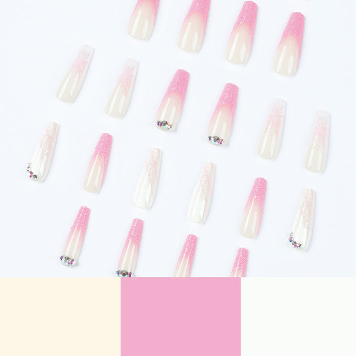Artistic stiletto nails with glitter and snowflake design Kalsten