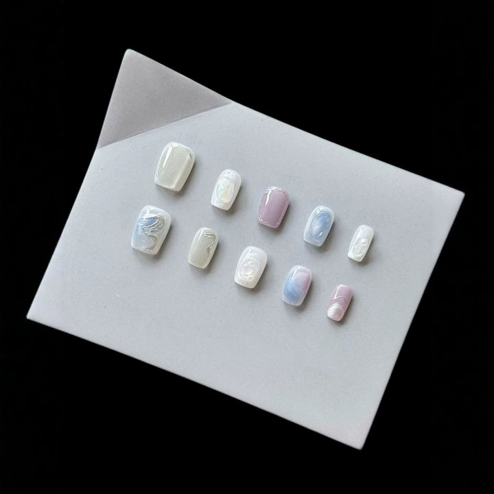 Artistic Press-On Nail Art Set with Pearlescent and Marble Designs