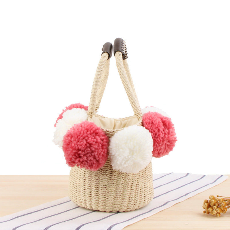 Basket bag with pompom decorated top edge Kalsten