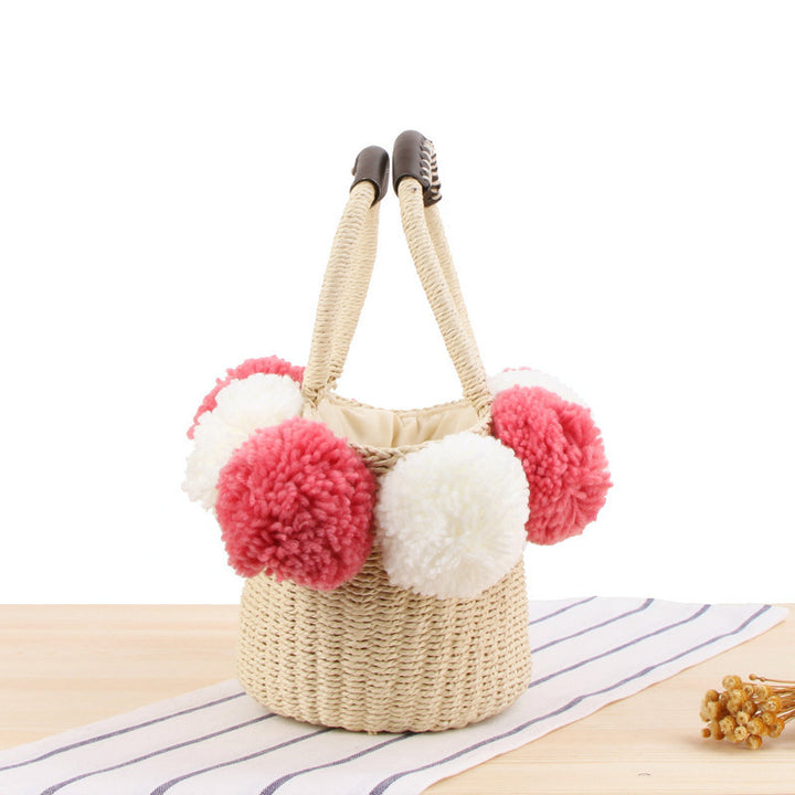 Basket bag with pompom decorated top edge Kalsten