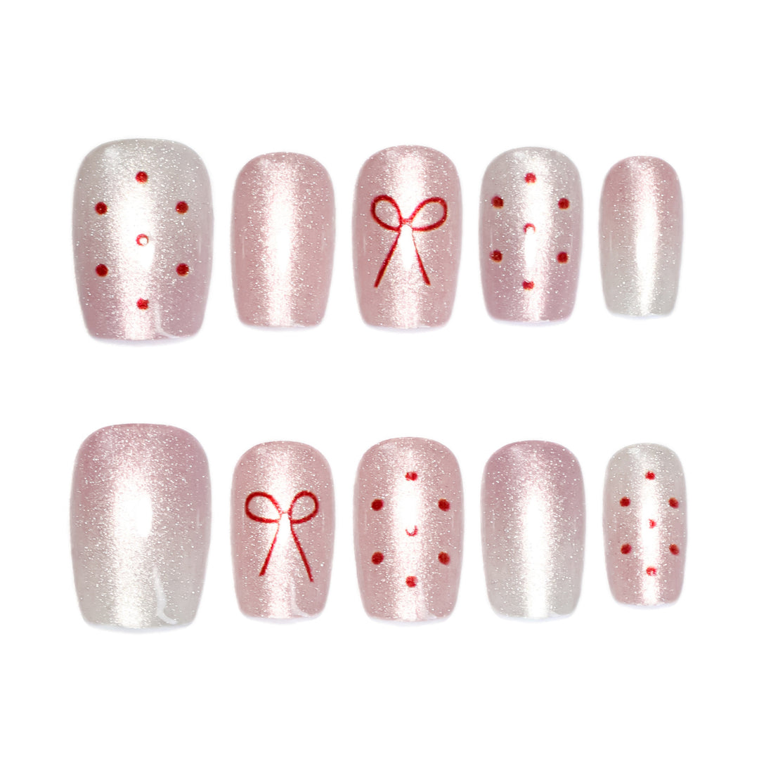 Artificial nail art with cute bow design Kalsten