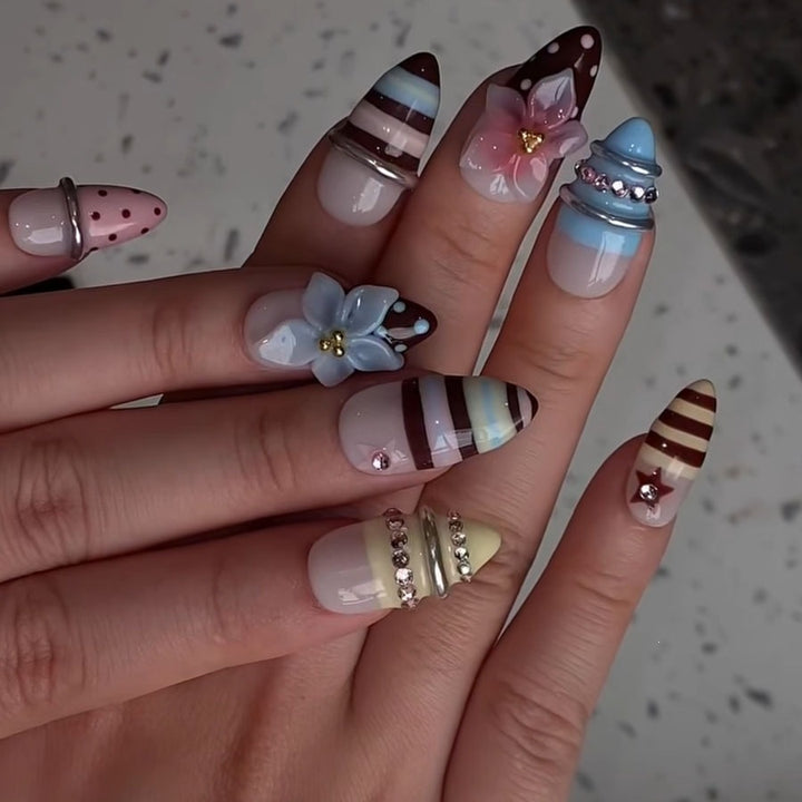 Creative nail art set with floral and striped accents Kalsten