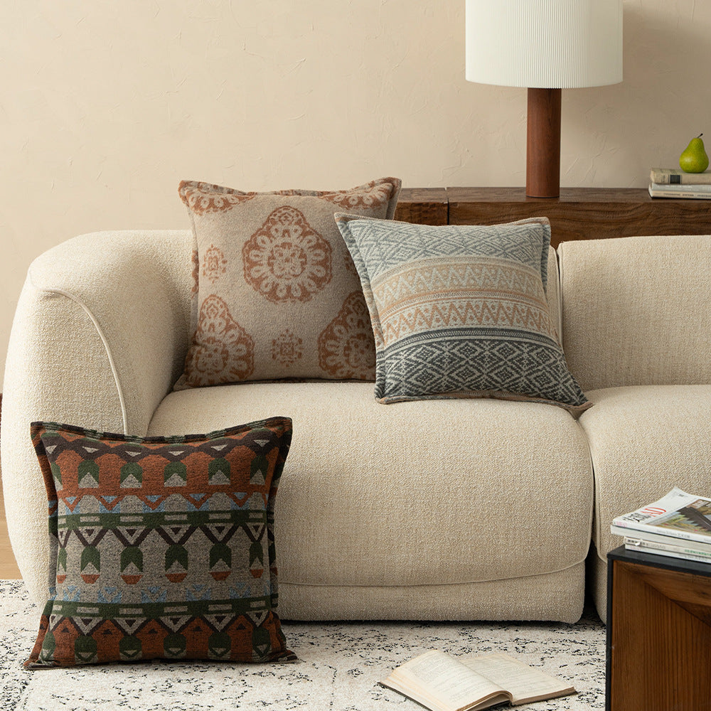 Square decorative sofa cushion with jacquard-woven ornament and soft bouclé surface Kalsten