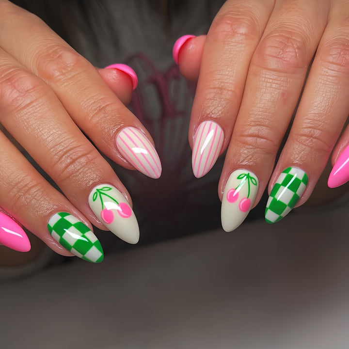 Artificial nails with fruity cherry design and striking colors Kalsten