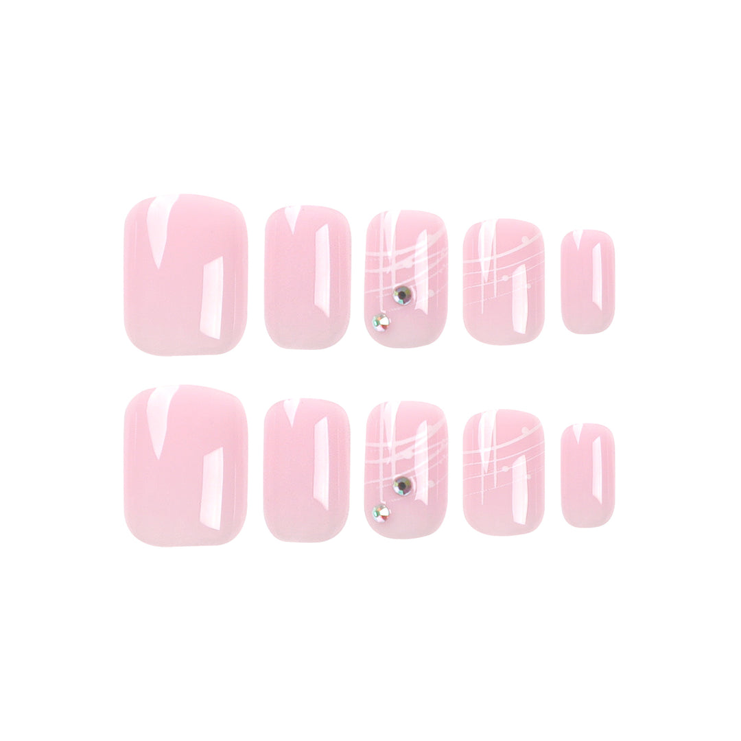 Artful nail extensions with elegant design and rhinestone embellishments Kalsten