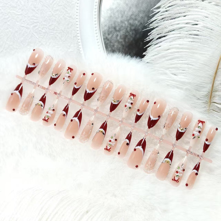 Artificial nails with festive designs and glitter accents Kalsten