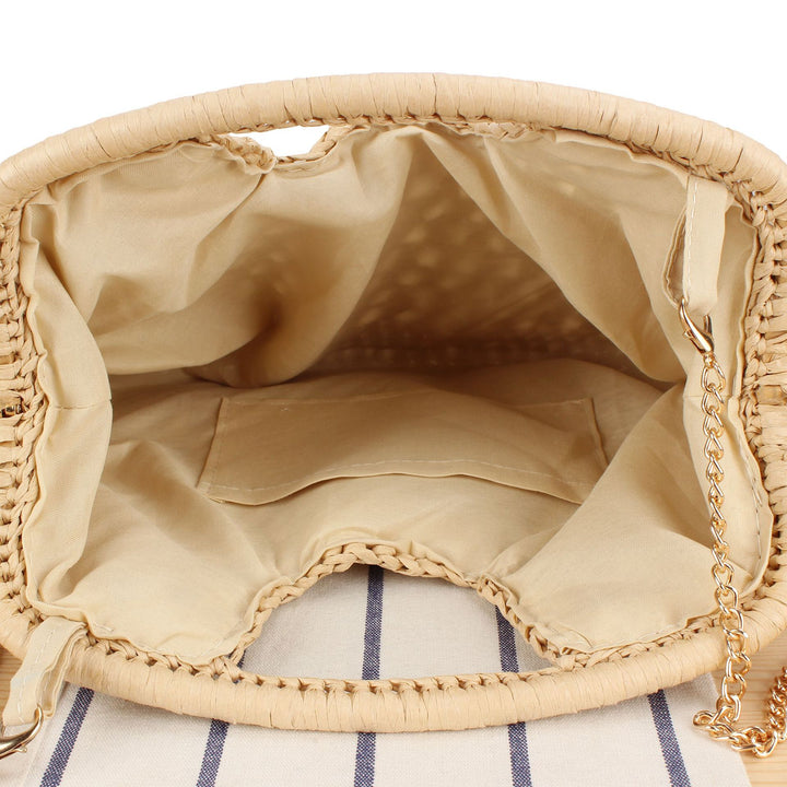 Handbag made of naturally untreated woven material with elegant chain embellishment Kalsten