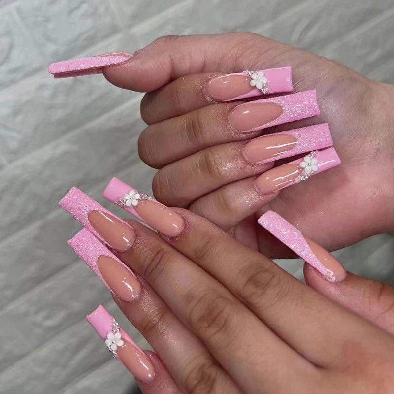 Glittering nail extensions with floral design Kalsten