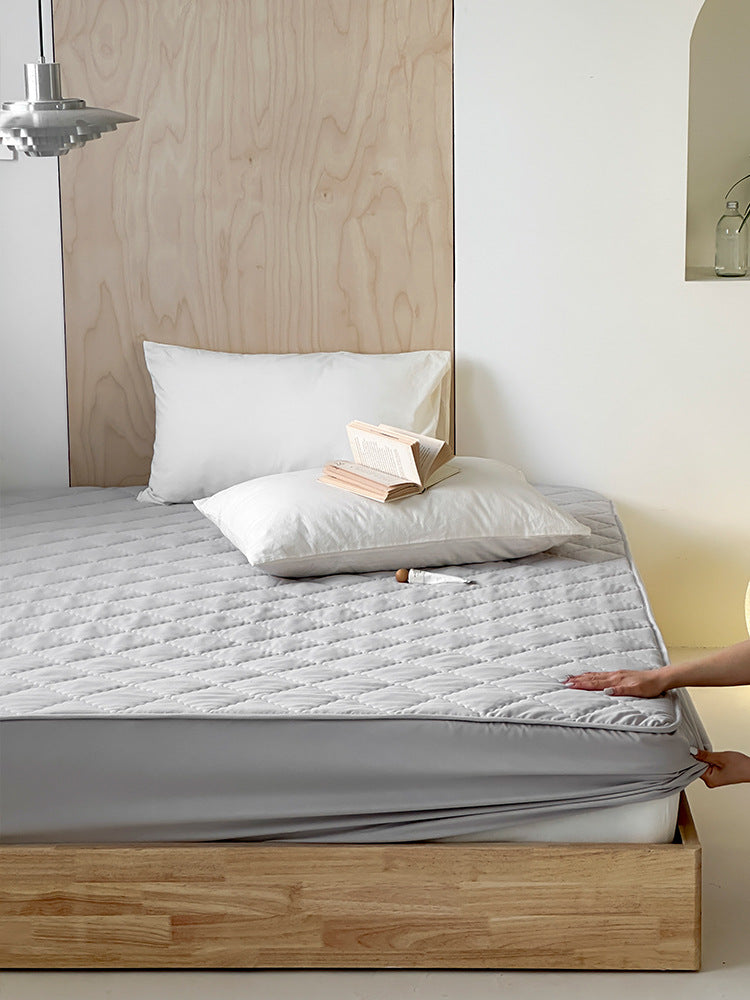 Quilted mattress topper with all-around elastic and breathable microfiber