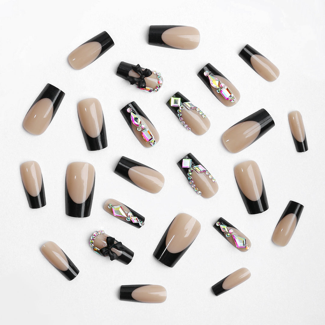 Glamorous artificial nail set with sparkling rhinestone and bow decorations Kalsten