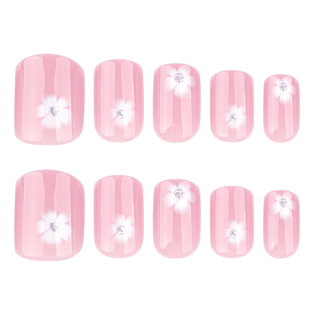 Elegant artificial nails with filigree floral motifs and glitter accents Kalsten