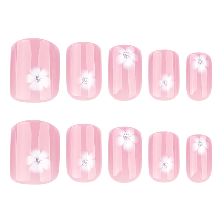 Elegant artificial nails with filigree floral motifs and glitter accents Kalsten
