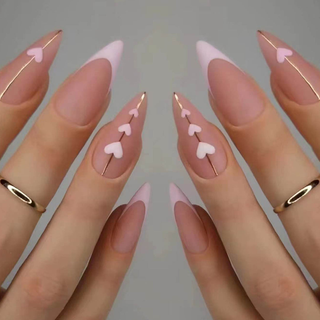 Artful stiletto nails with heart accents Kalsten