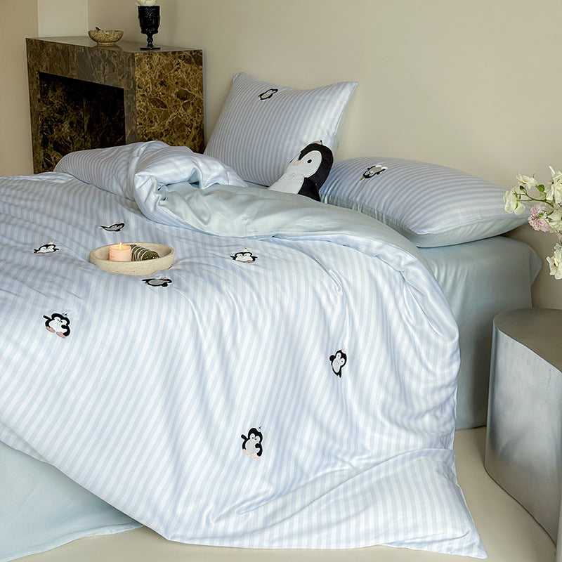 Satin bedding set with silky glossy striped design and subtle panda illustration