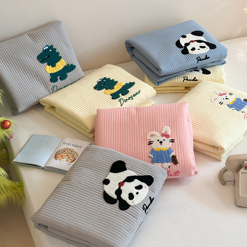 Padded mattress pad with ribbed structure, elastic fitted edge, and panda embroidery