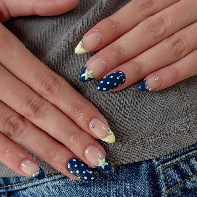 Artistic Nail Design with Star and Polka Dot Accents Kalsten