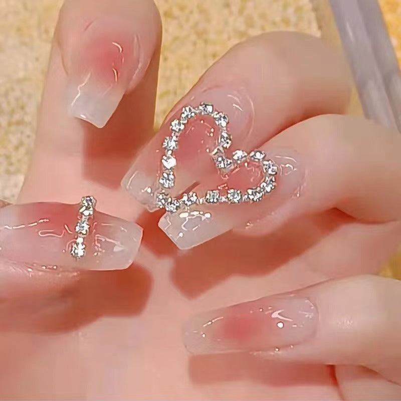 Artistic gel nails with heart accents Kalsten