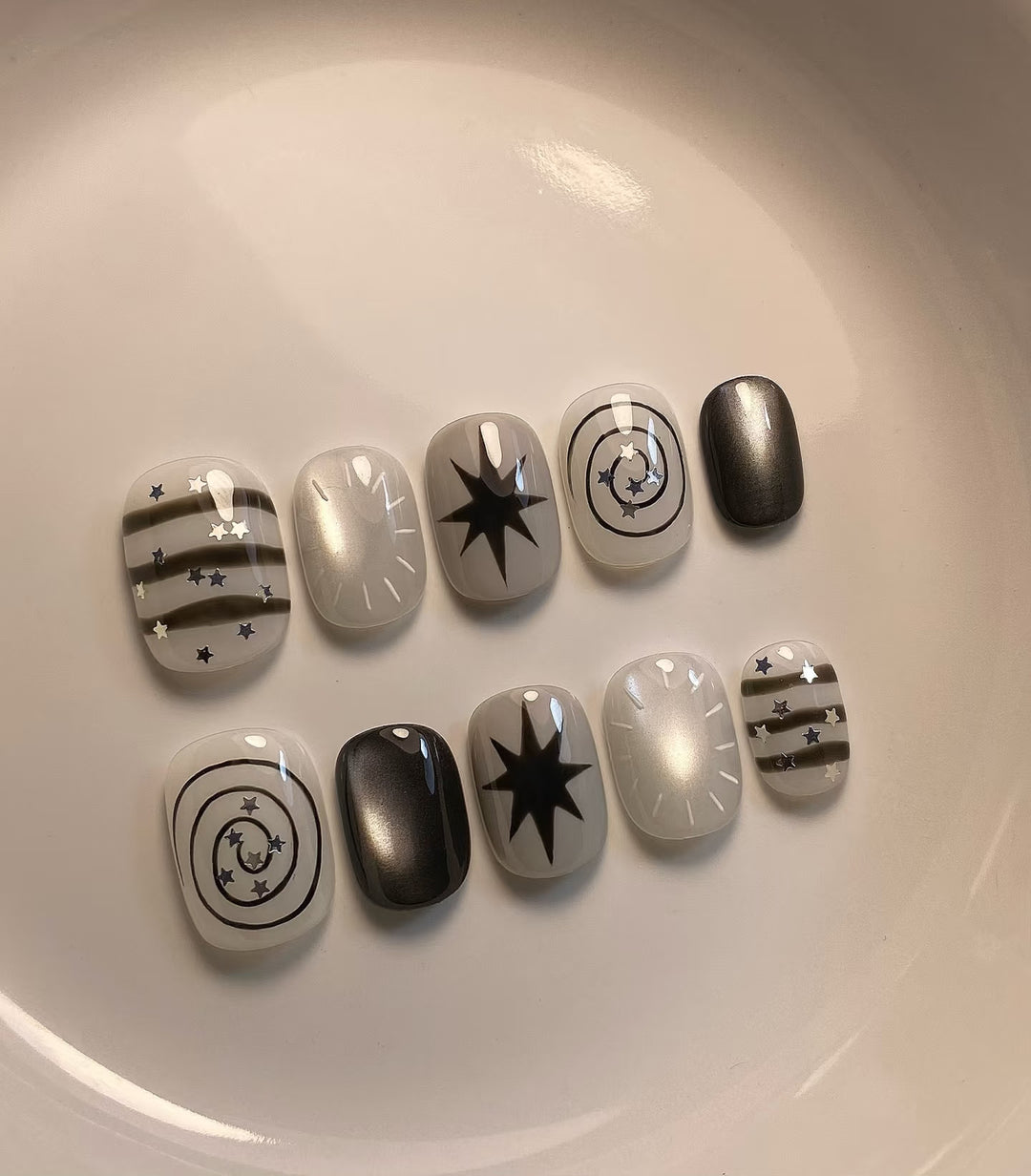 Artistic Press-On Nail Art Set with Celestial Designs