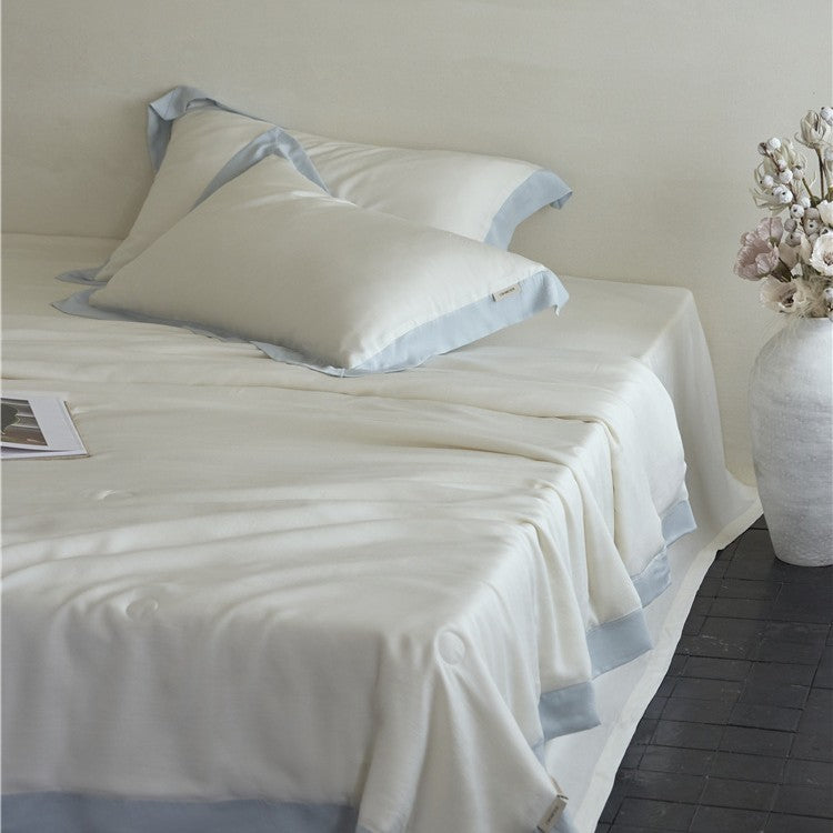Elegant satin bedding set with silky touch, contrasting border and concealed closure