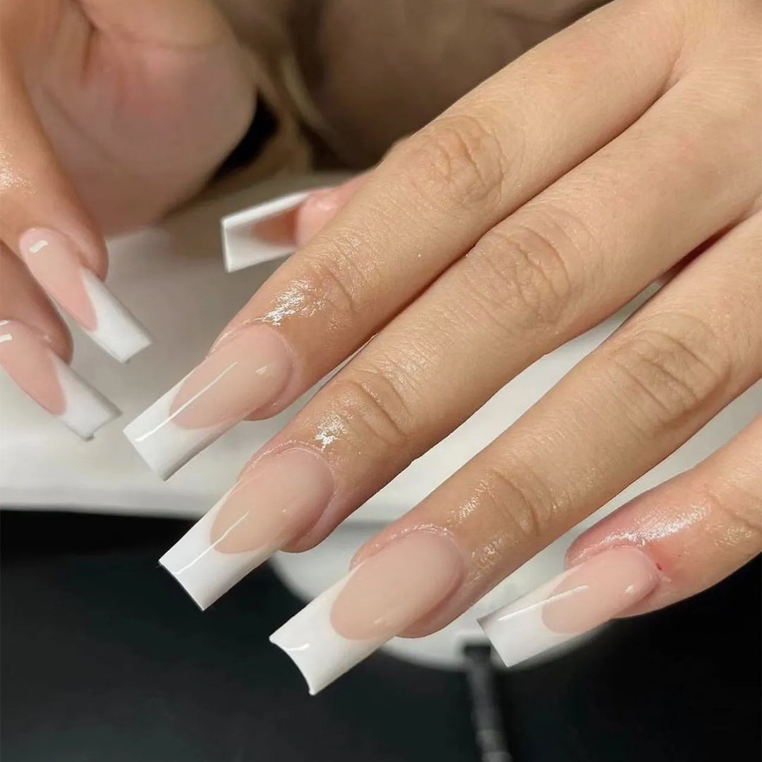 Artful nail extensions with elegant French tips Kalsten