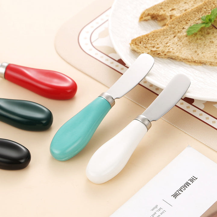 Elegant spreader knife with ergonomic handle Kalsten