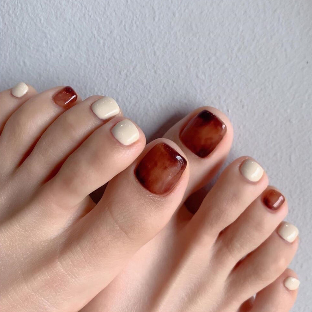 Artful toenail design with rich color gradients Kalsten