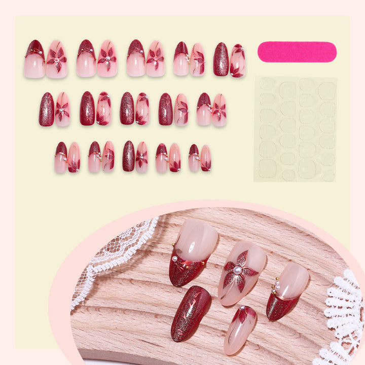 Glamorous artificial nail set with elegant floral and glitter details Kalsten