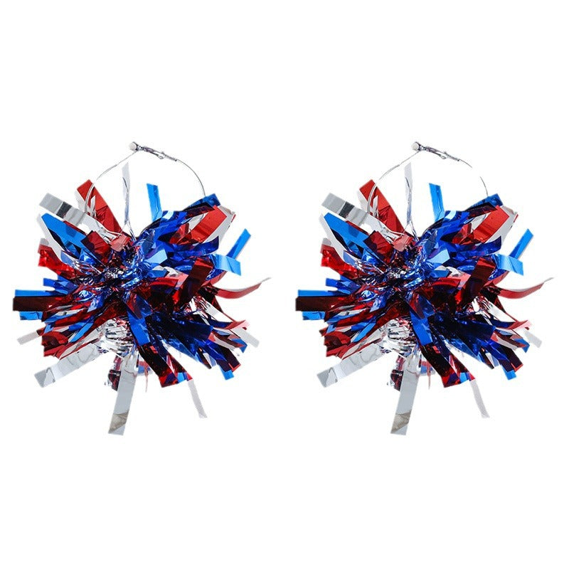 Women with eye-catching pompom hoops with lametta tassels and lightweight wire closure Kalsten