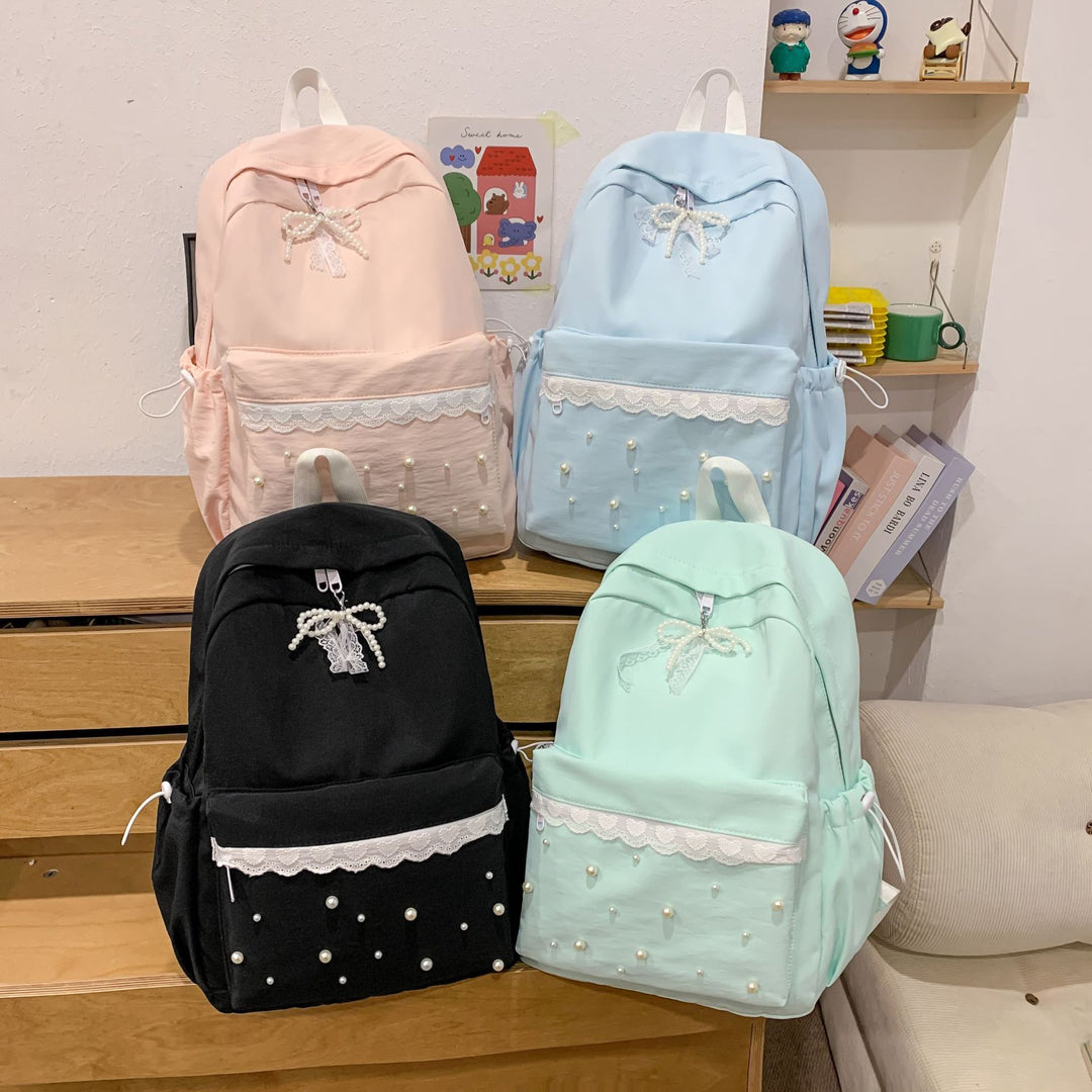 Backpack with elegant pearl applications and intricate design Kalsten