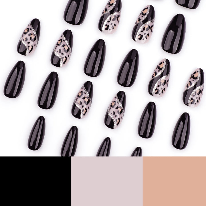 Artistic stiletto nails with leopard design and glitter effects Kalsten
