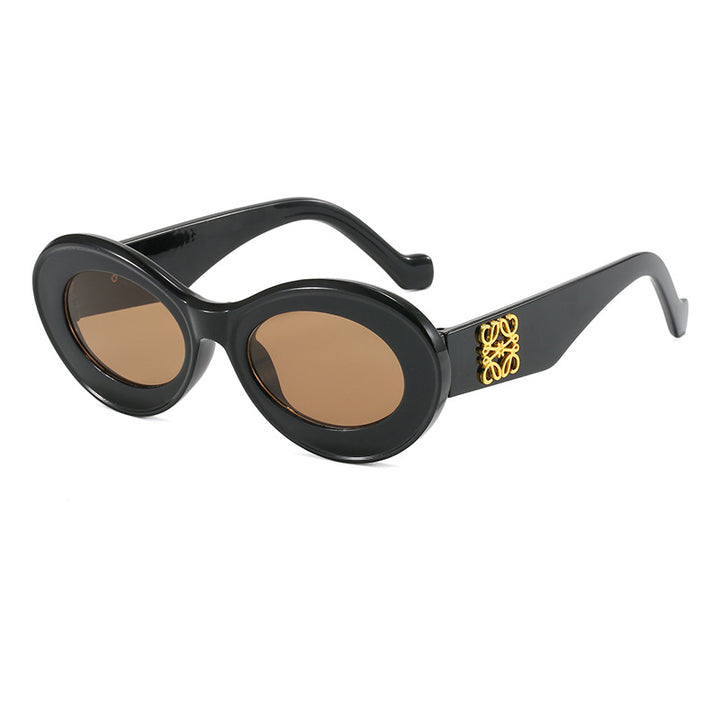 Women's fashionable sunglasses with oval frame and golden applications Kalsten