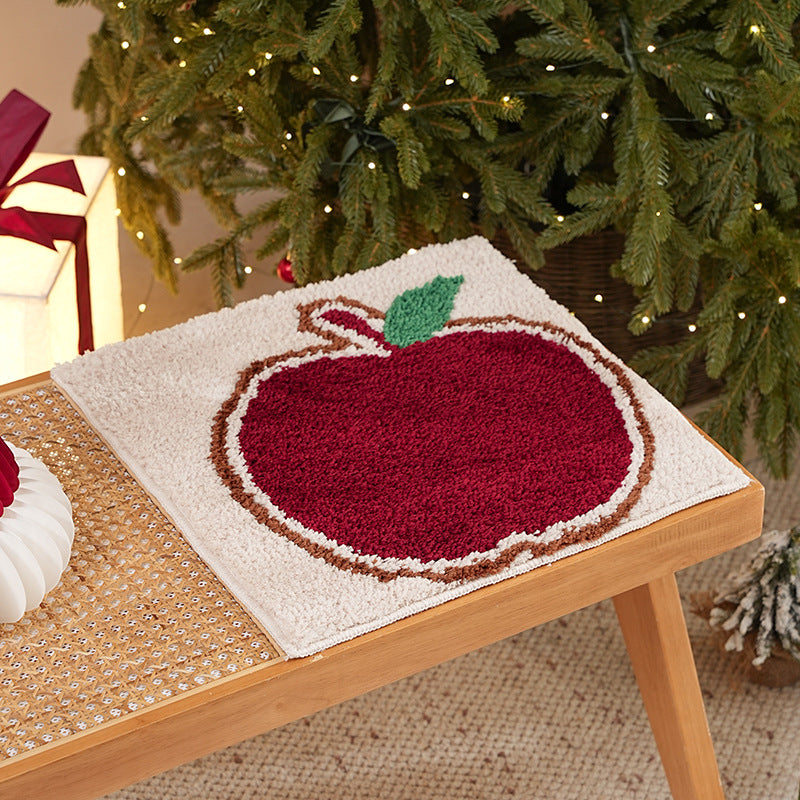 Tufted Christmas placemat with gingerbread house motif Kalsten