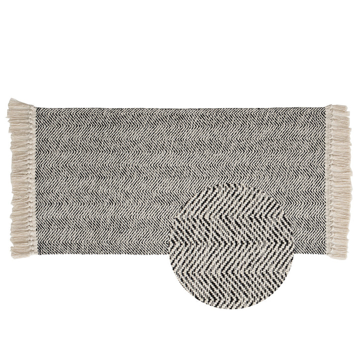 Braided runner rug with herringbone pattern and fringe edge Kalsten