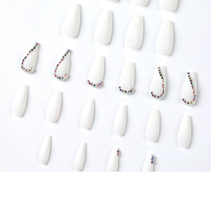 Artful Nail Extensions with Heart Design and Glitter Accents Kalsten