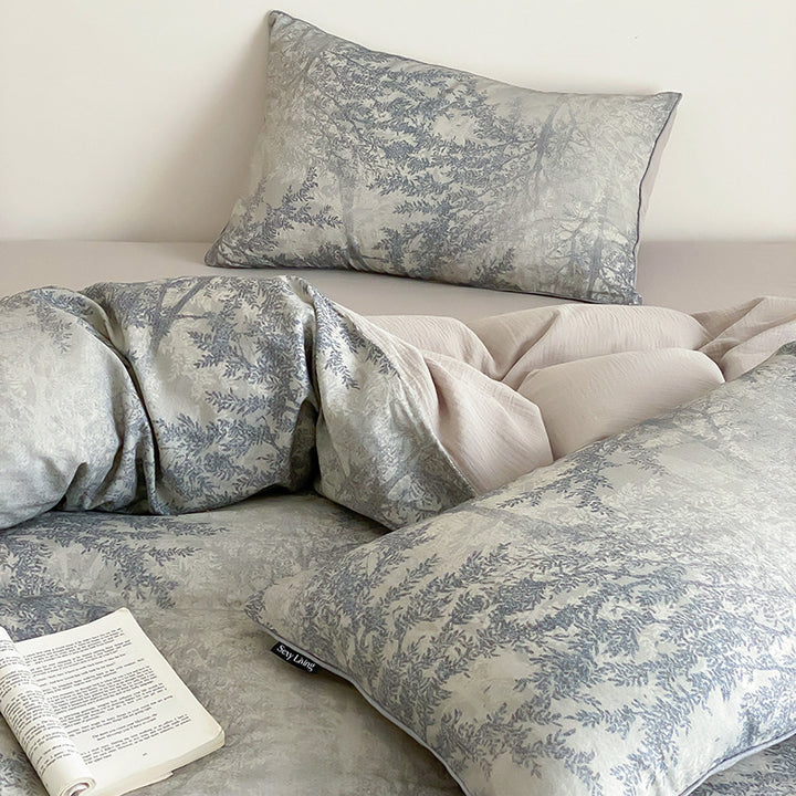 Bed linen set made of cotton satin with delicate branch and leaf print