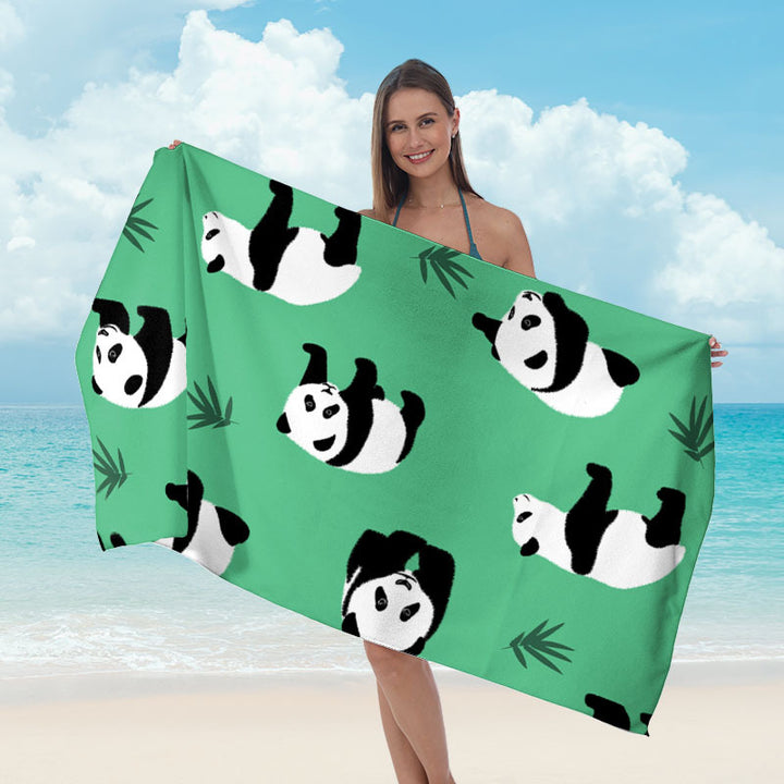 Beach towel with tropical leaf design Kalsten
