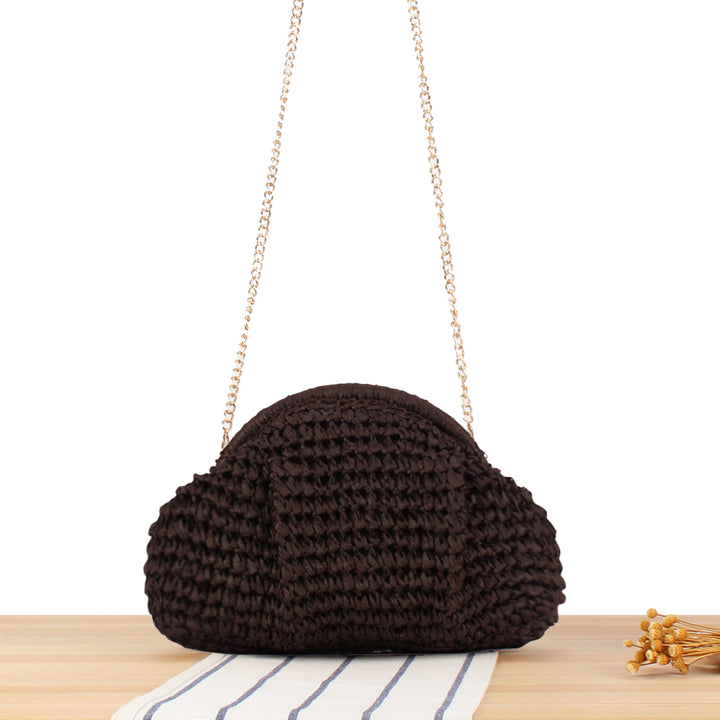 Shoulder bag made from handcrafted natural fibers with elegant chain decoration Kalsten