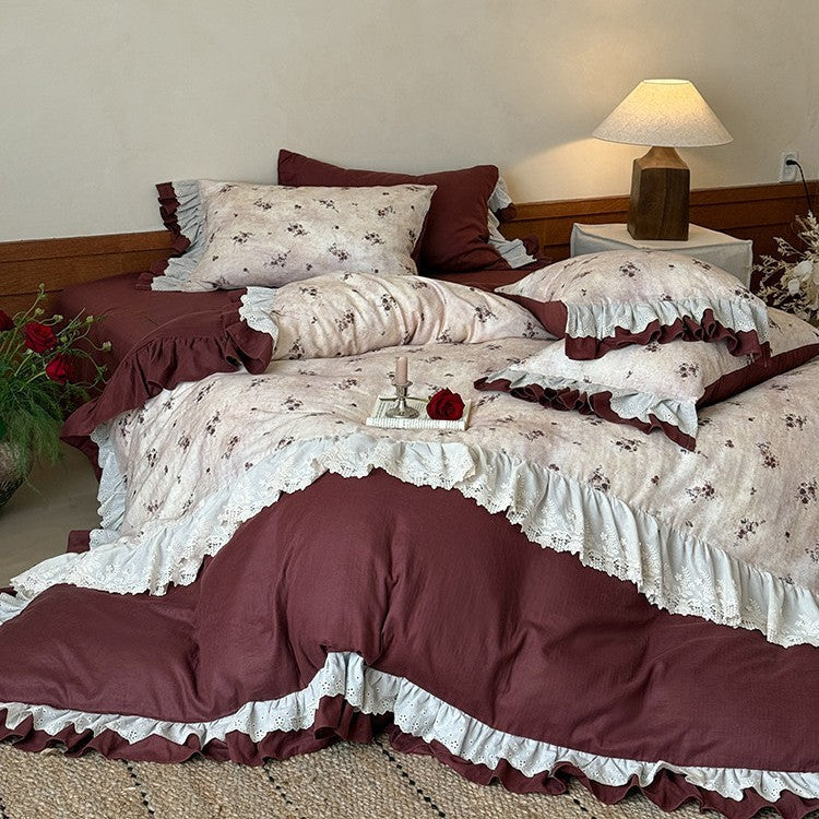 Romantic bed linen set with lace trim, ruffles, and fine floral print