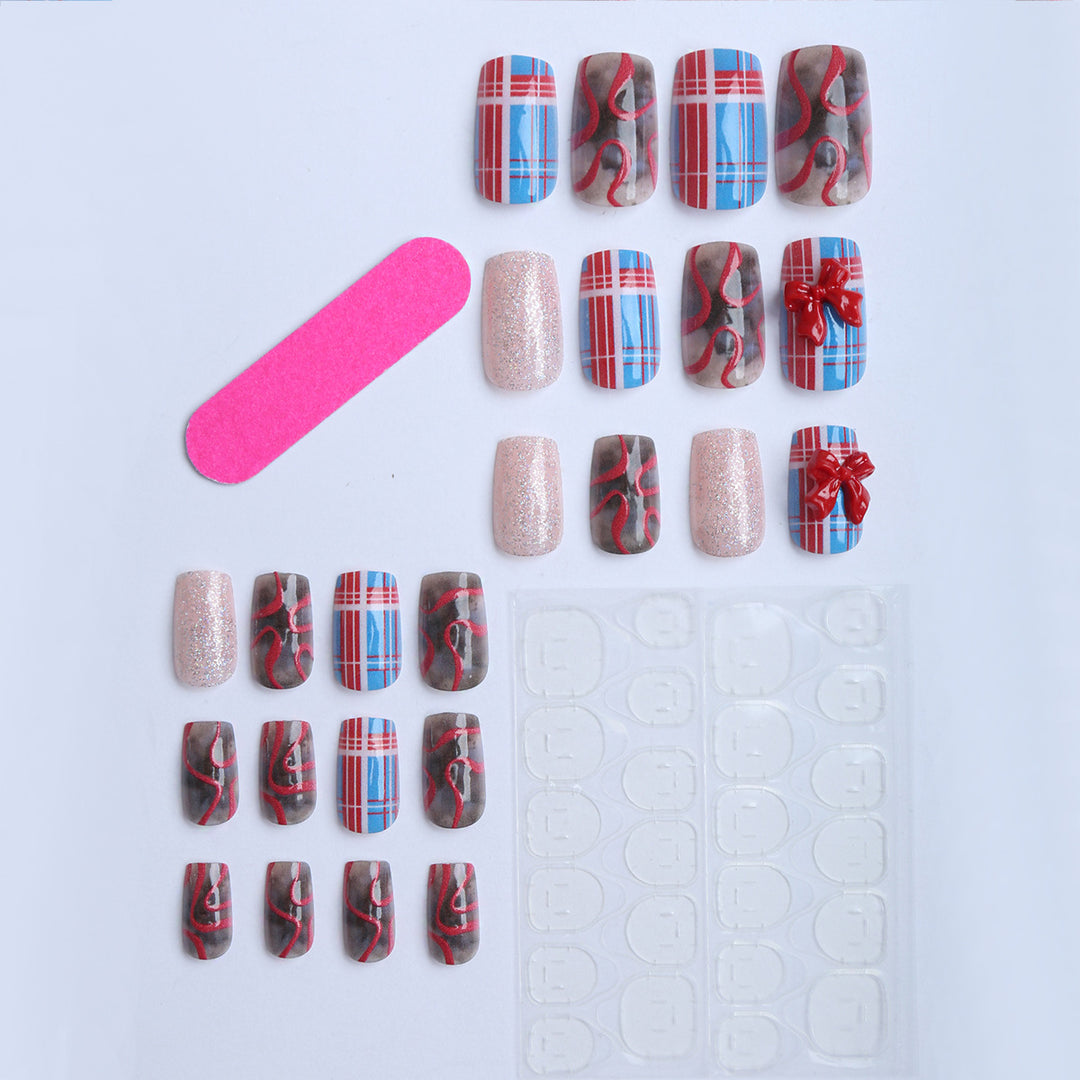 Artificial nails with festive gift design and glitter Kalsten