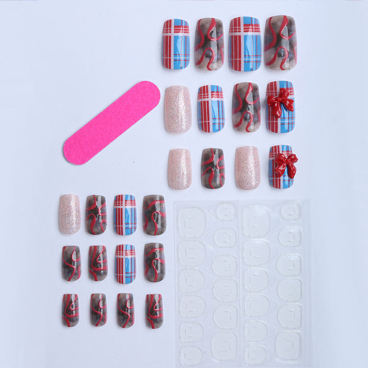 Artificial nails with festive gift design and glitter Kalsten