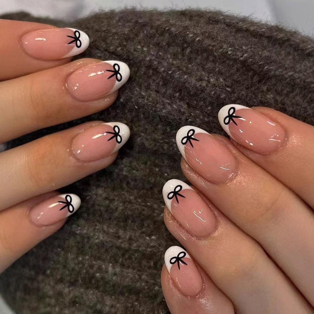 Artificial nails with elegant bows and high-gloss surface Kalsten