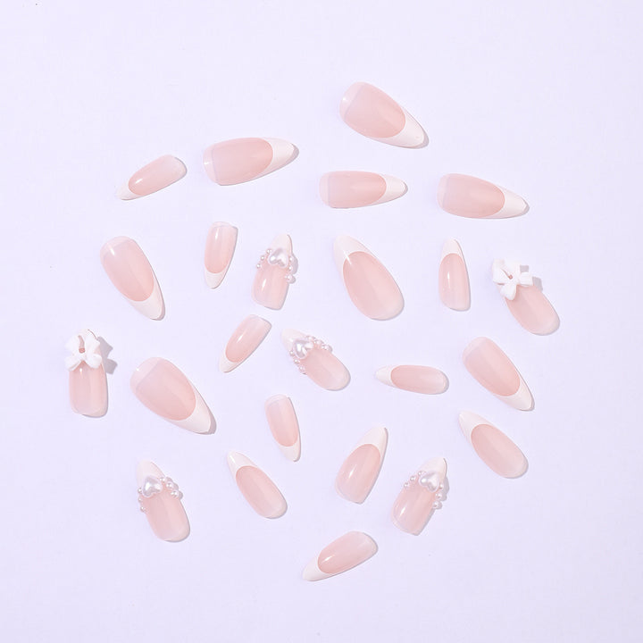 Artificial nail set with elegant pearl and bow decorations Kalsten