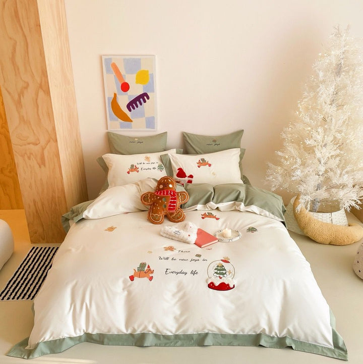 Festive cotton satin bedding set with embroidered Christmas motifs and contrasting borders