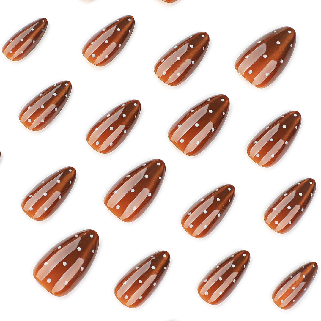 Artful nail extensions with glossy ombre effect and elegant dots Kalsten