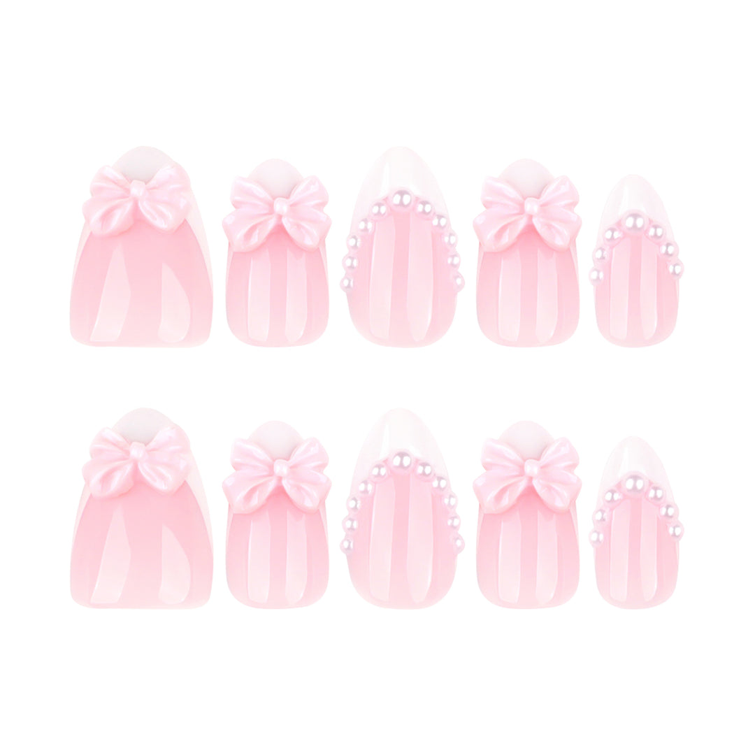 Artful Stiletto Nails with Delicate Bow Accents Kalsten