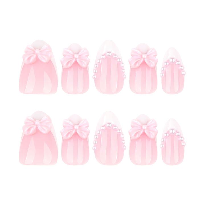 Artful Stiletto Nails with Delicate Bow Accents Kalsten