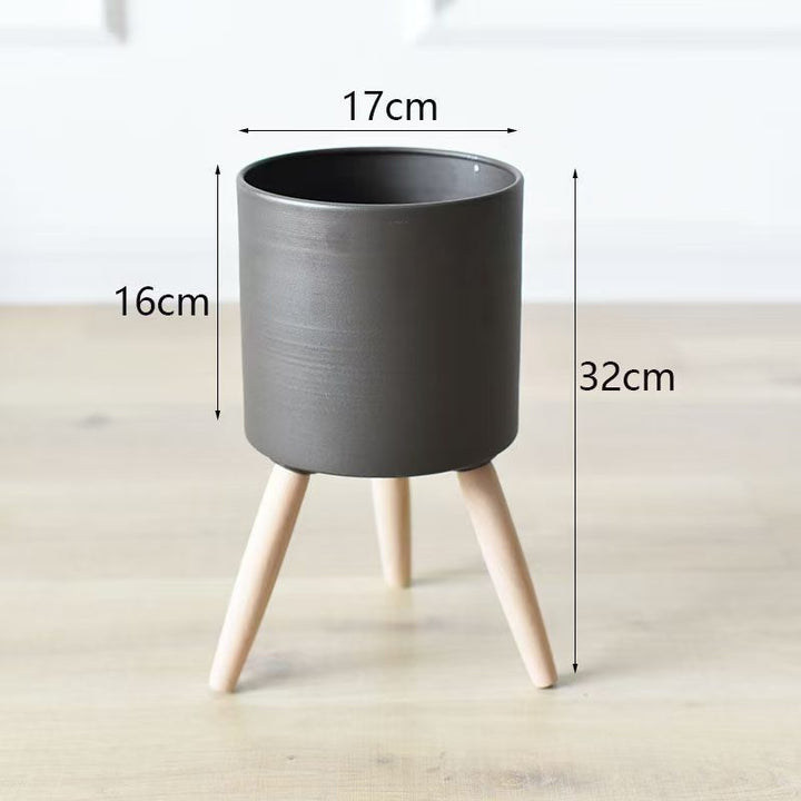 Plant pot with wooden stand