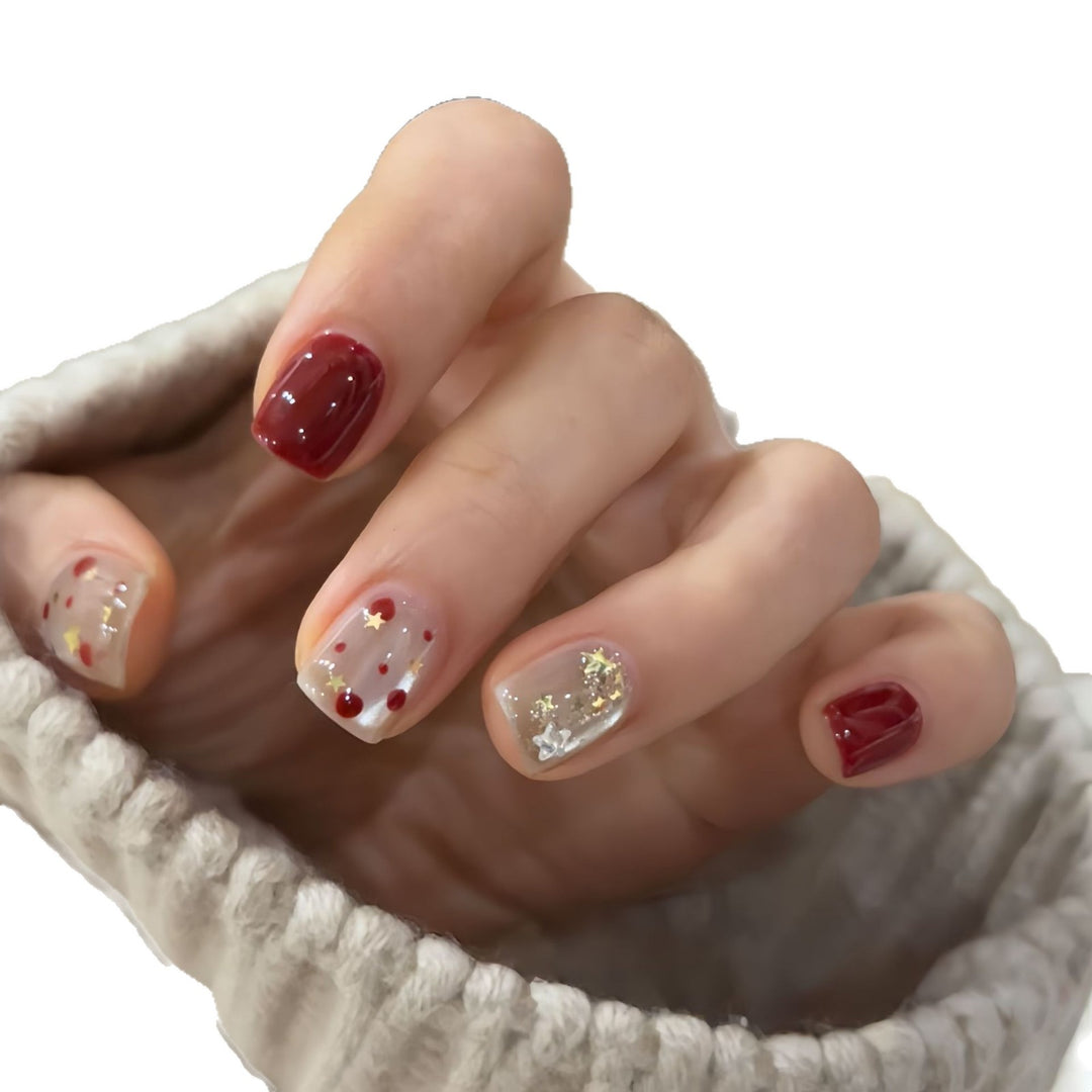 Nail set with sparkling glitter details and creative designs Kalsten